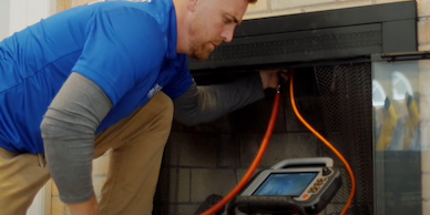 chimney technician performing an inspection