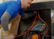 chimney technician performing an inspection