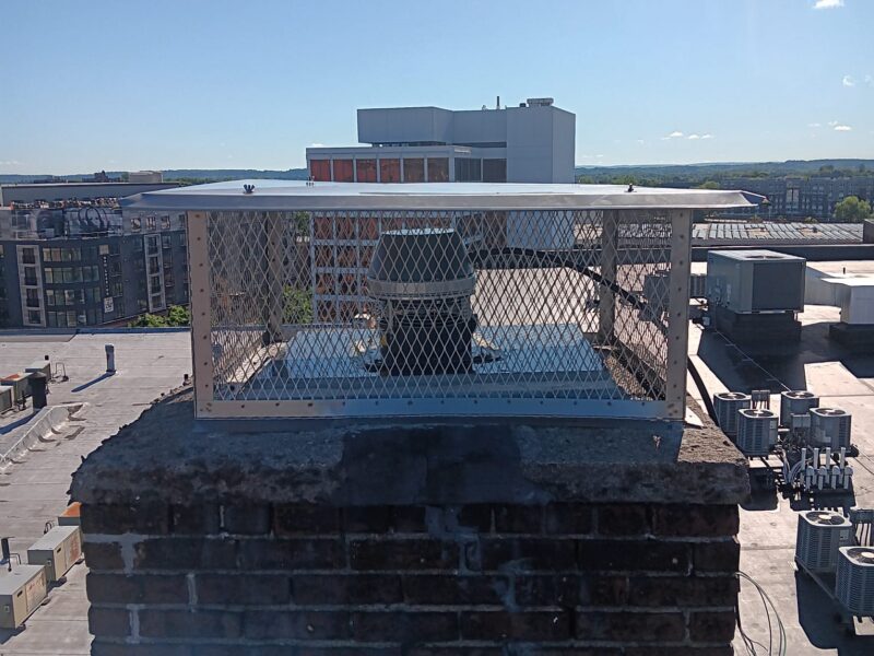 Downtown New Britain Commercial Chimney Cap Completed commercial rooftop chimney cap project in downtown New Britain, CT