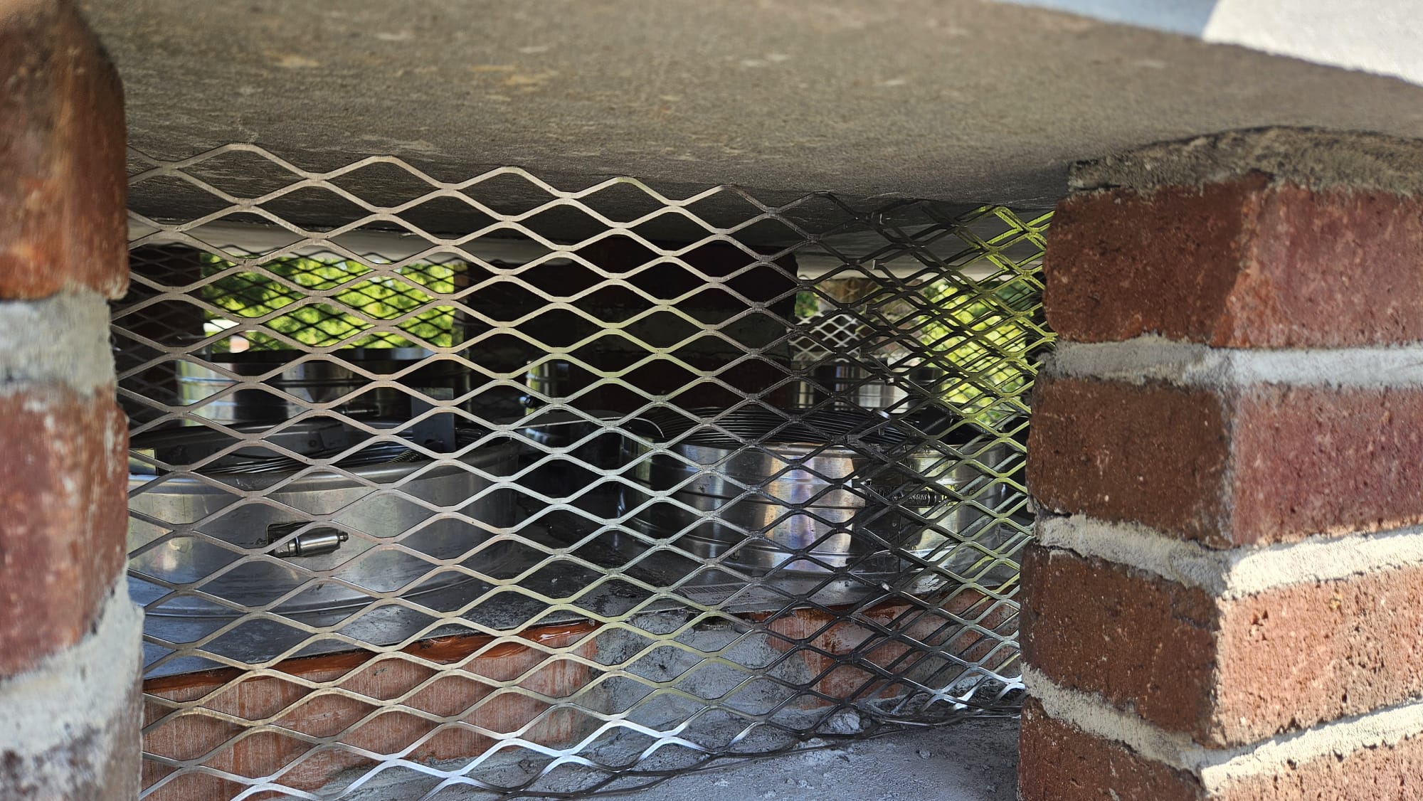 Multi-flue stainless terminals – North Stonington, CT Finished stainless-steel liner terminals and guards in North Stonington, Connecticut