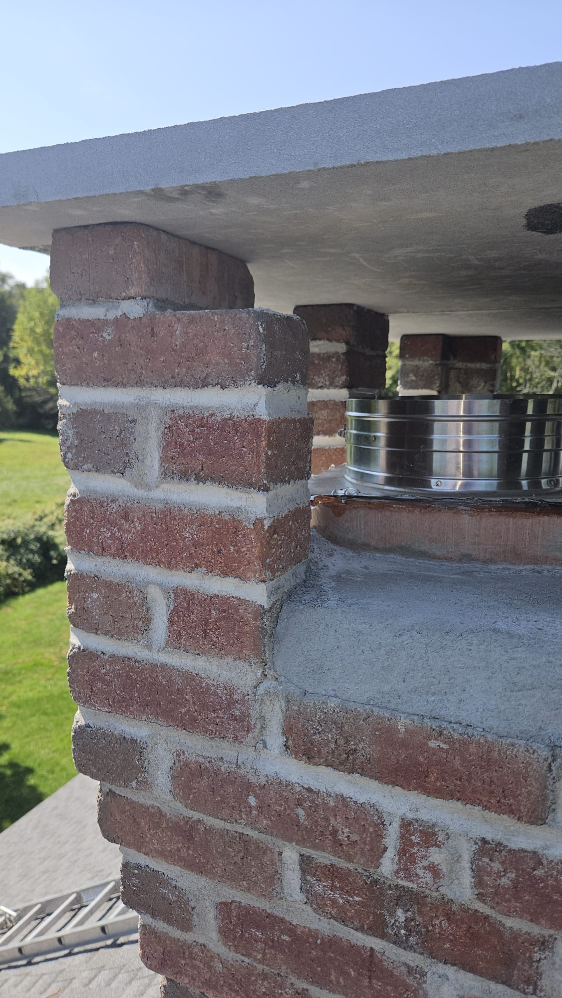 Bluestone chimney top and terminal – North Stonington, CT Finished bluestone chimney top, masonry pillar and stainless terminal in North Stonington, Connecticut