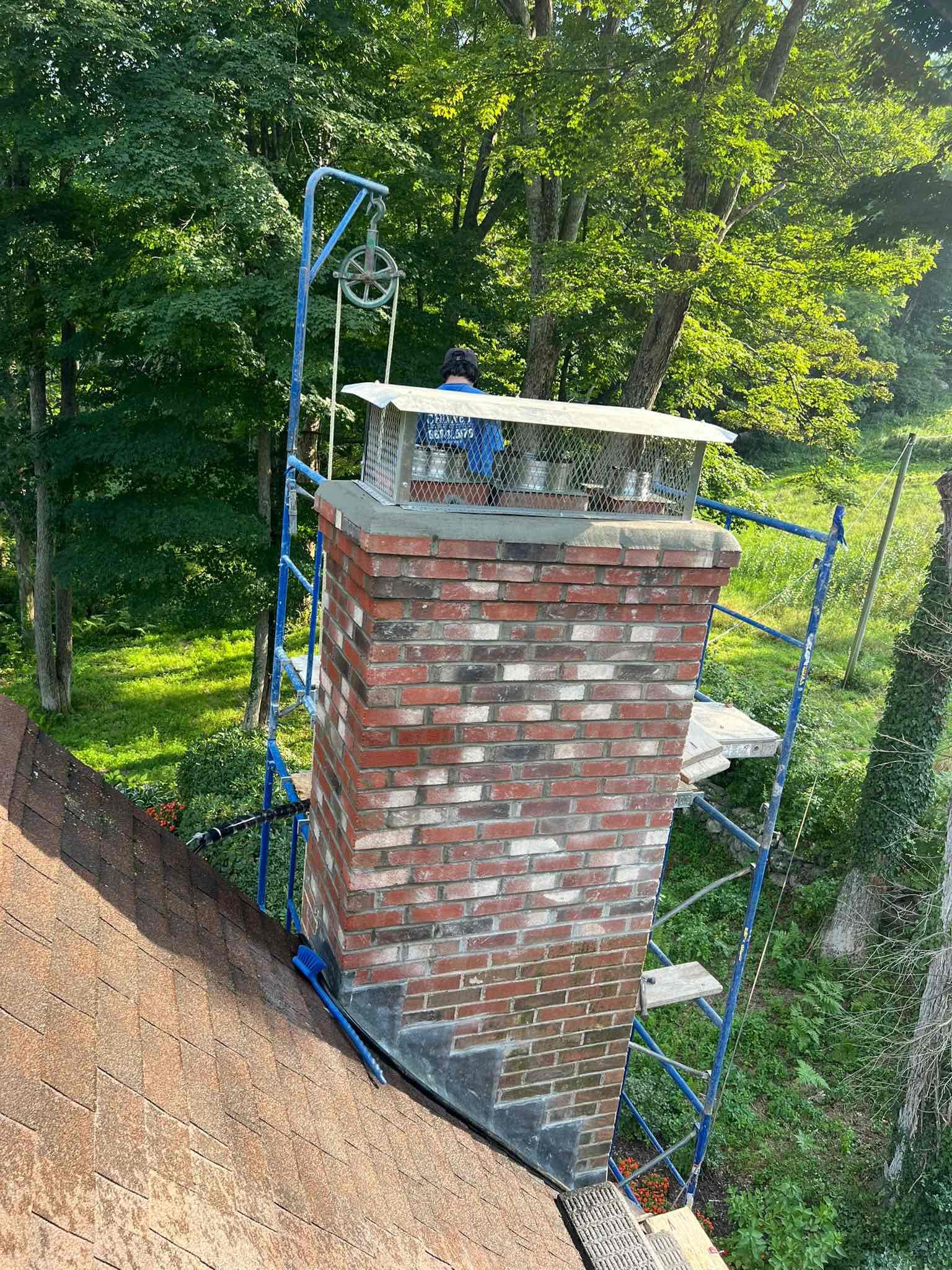 chaplin-finished-chimney-rebuild-close Close view of finished Chaplin chimney masonry, crown and cap