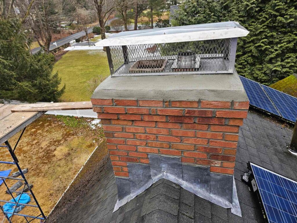 fairfield-ct-new-crown-and-cap New chimney crown and custom multi-flue cap in Fairfield, Connecticut