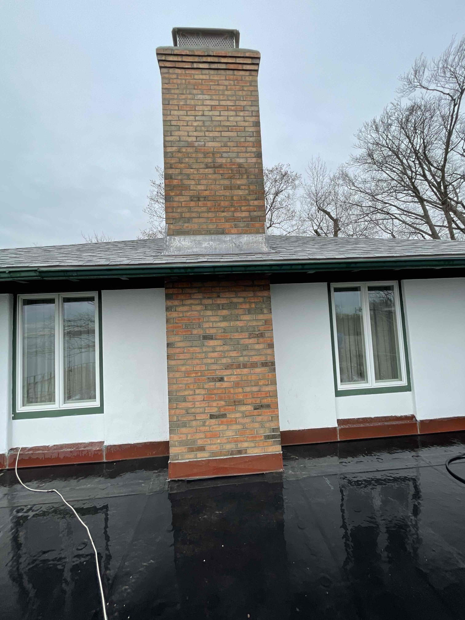 greenwich-chimney-rebuild-front Front view of completed masonry chimney rebuild in Greenwich, CT
