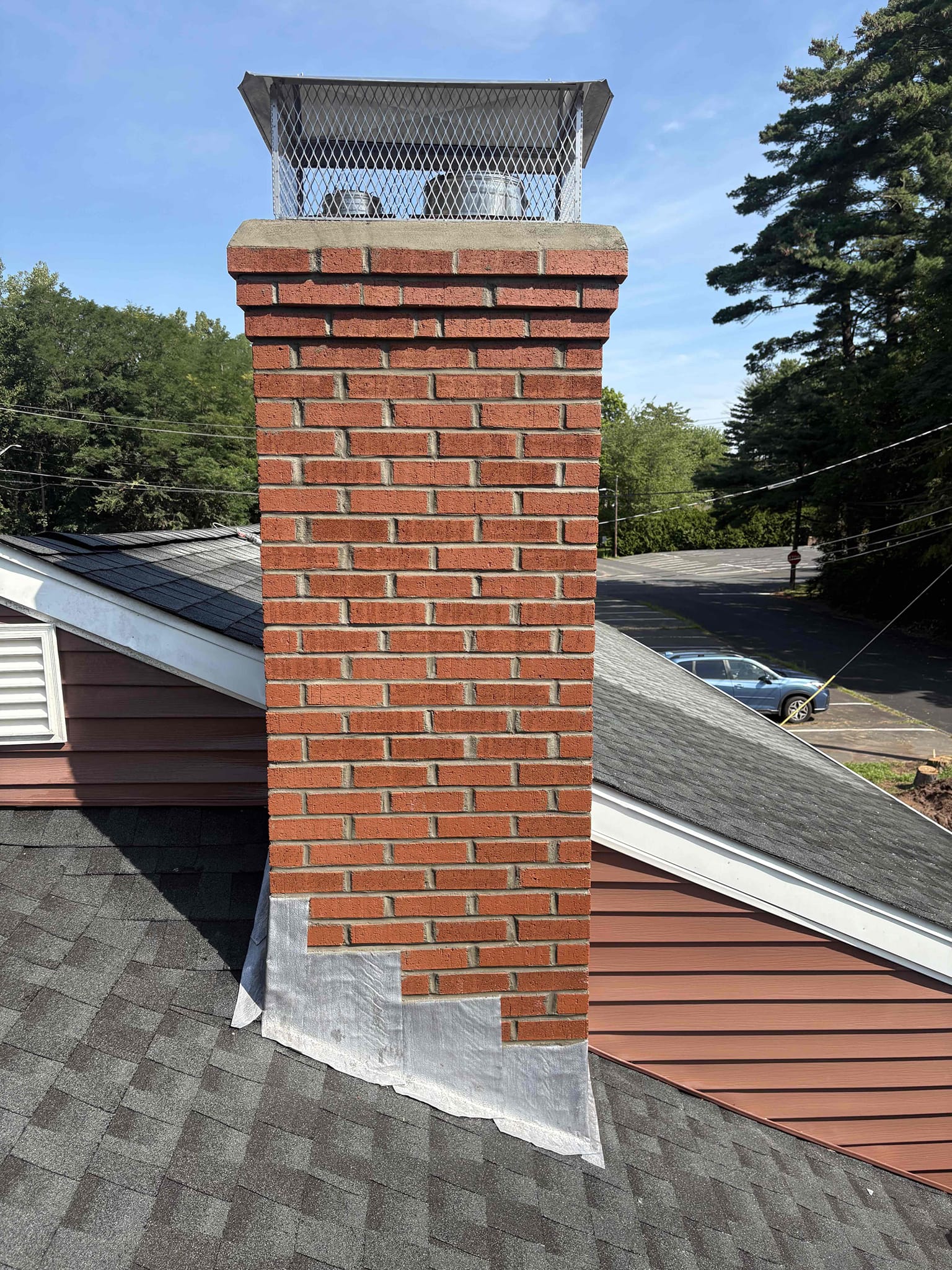 newington-finished-masonry-crown-cap Finished chimney masonry, crown, flashing and cap work in Newington, CT