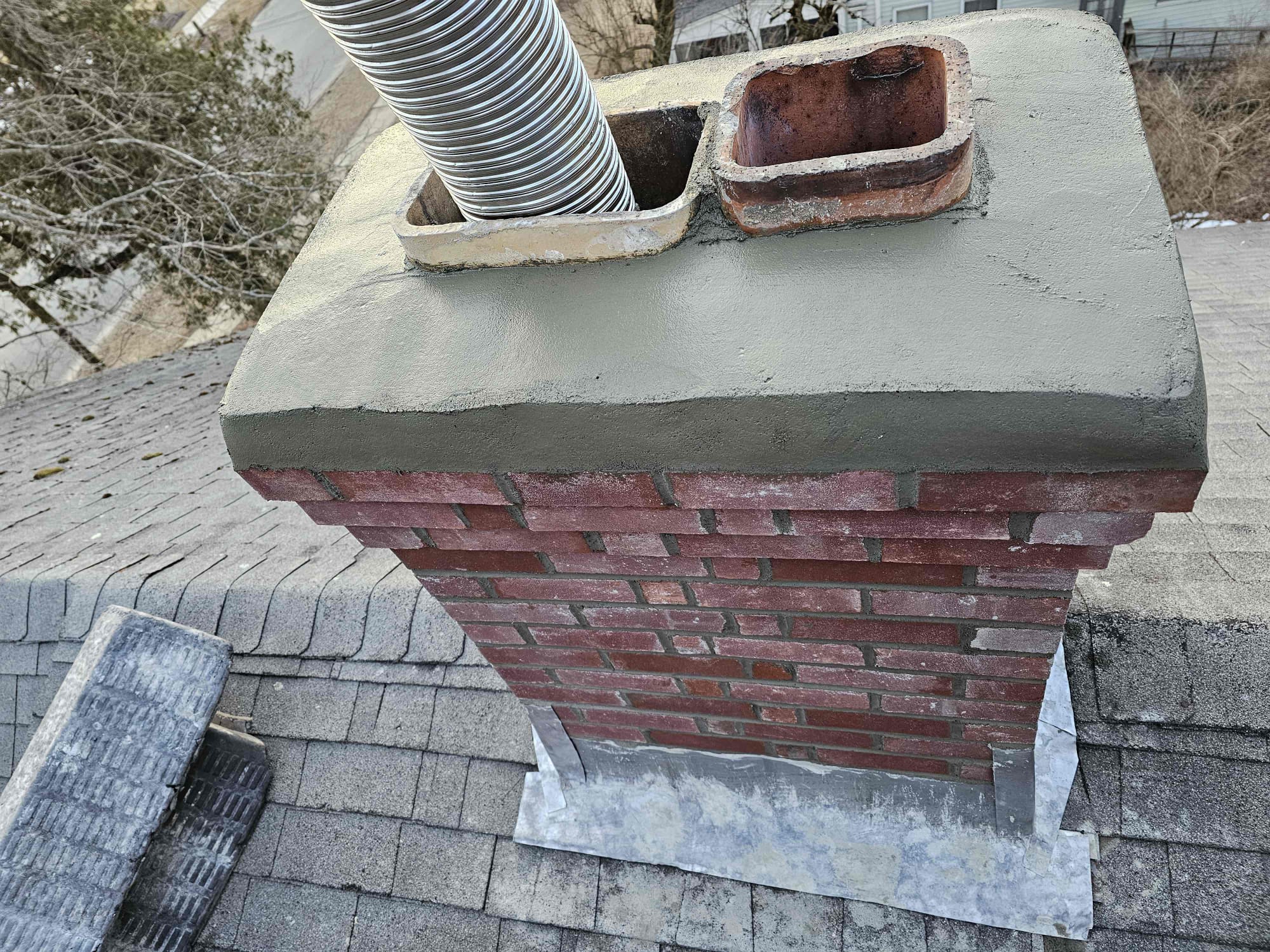New chimney crown and stainless liner during a North Canaan, Connecticut project