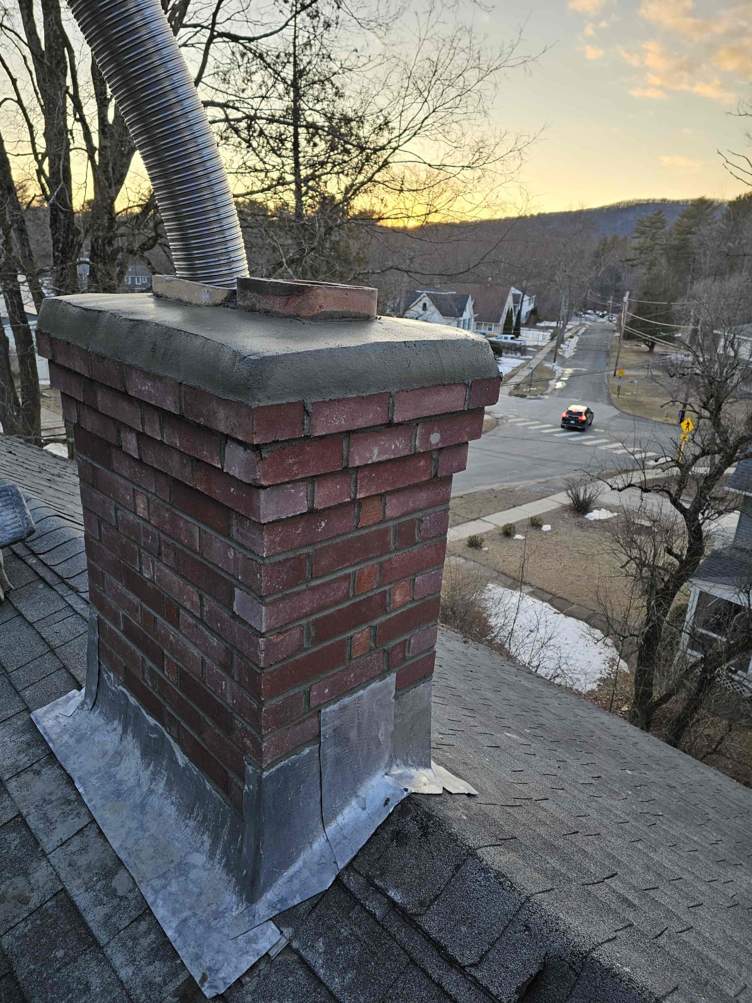 Rebuilt brick chimney with new lead flashing in North Canaan, Connecticut