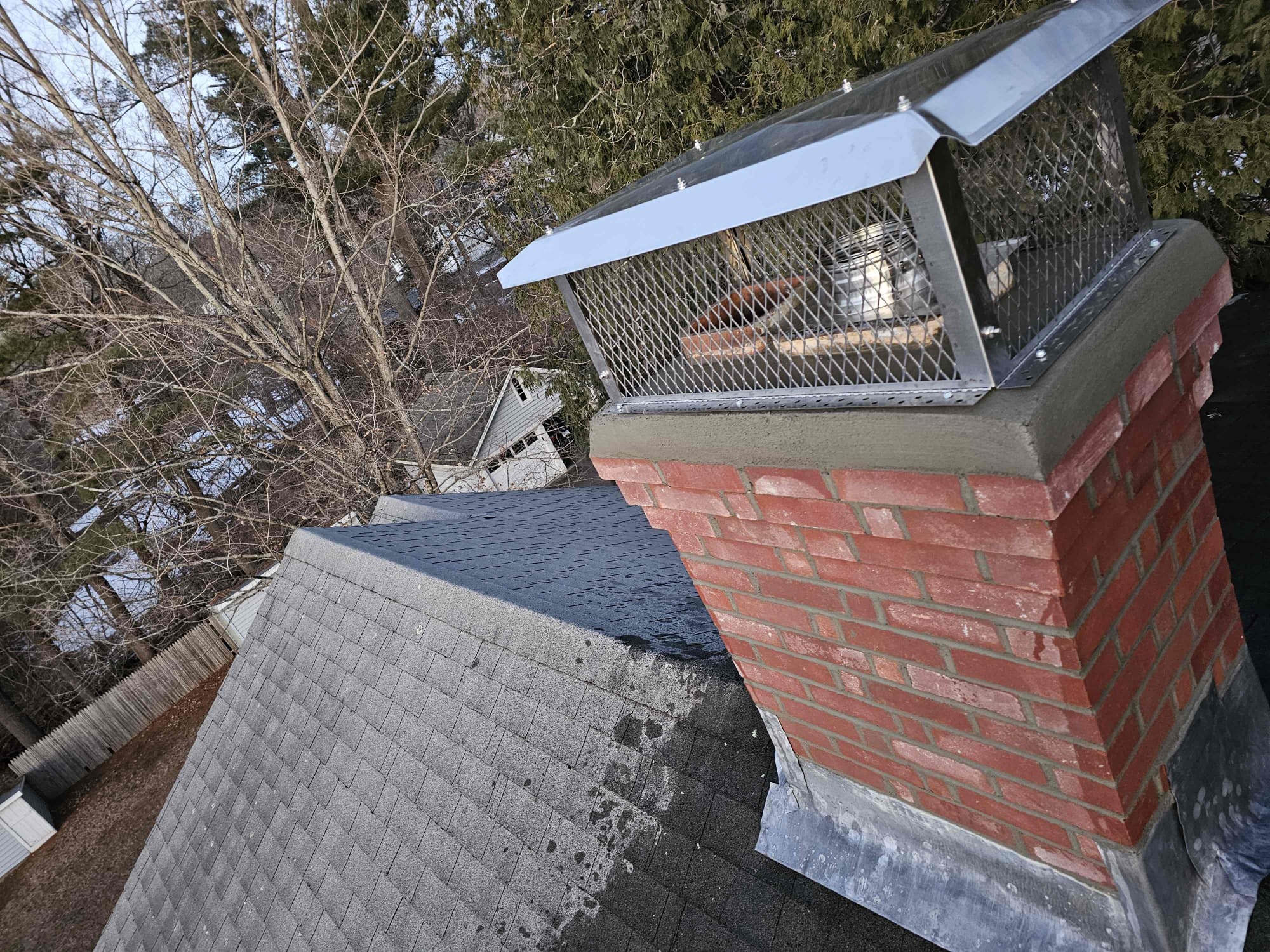 Stainless multi-flue chimney cap on a rebuilt North Canaan, Connecticut chimney