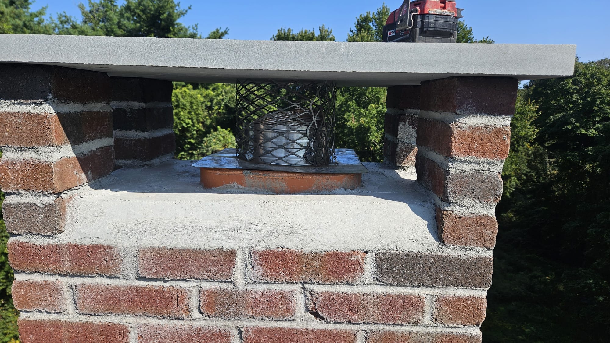 North Stonington, CT bluestone chimney cap Bluestone chimney cap and repaired crown in North Stonington, Connecticut