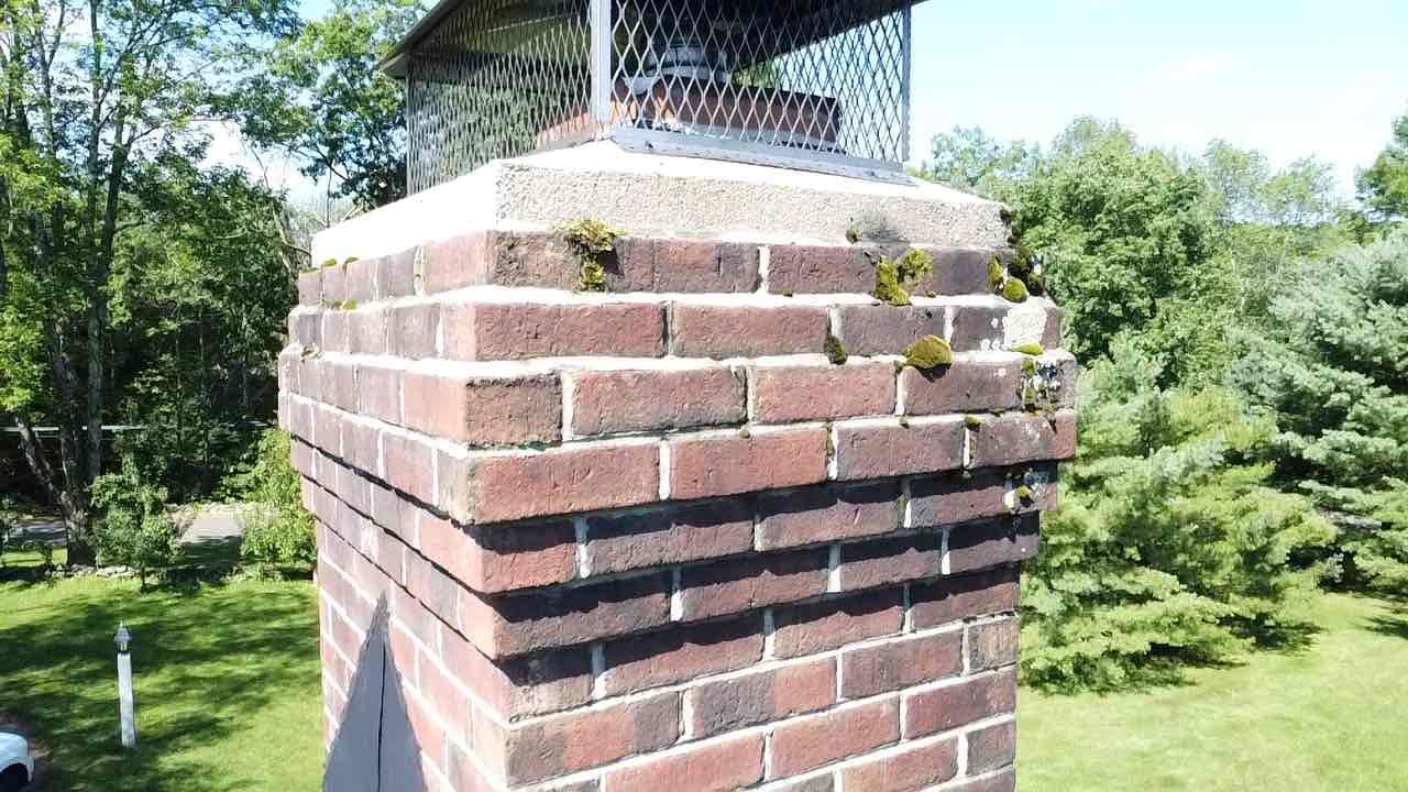 Union, CT chimney brick and crown damage Damaged brickwork and crown on a chimney inspected in Union, Connecticut