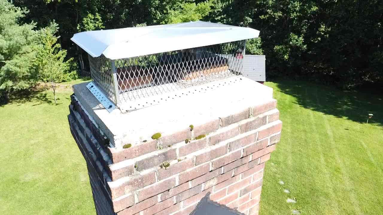 Union, CT chimney cap and crown inspection Chimney cap and crown inspected on a home in Union, Connecticut