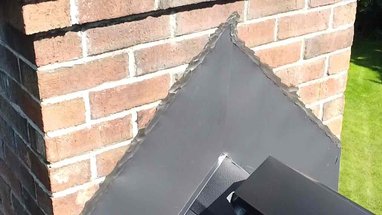 Union, CT chimney flashing inspection Roofline chimney flashing inspected at a home in Union, Connecticut