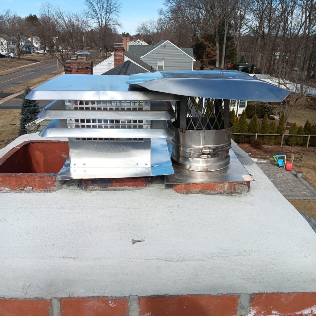 west-hartford-ct-crown-and-caps New crown and stainless-steel chimney caps in West Hartford, Connecticut
